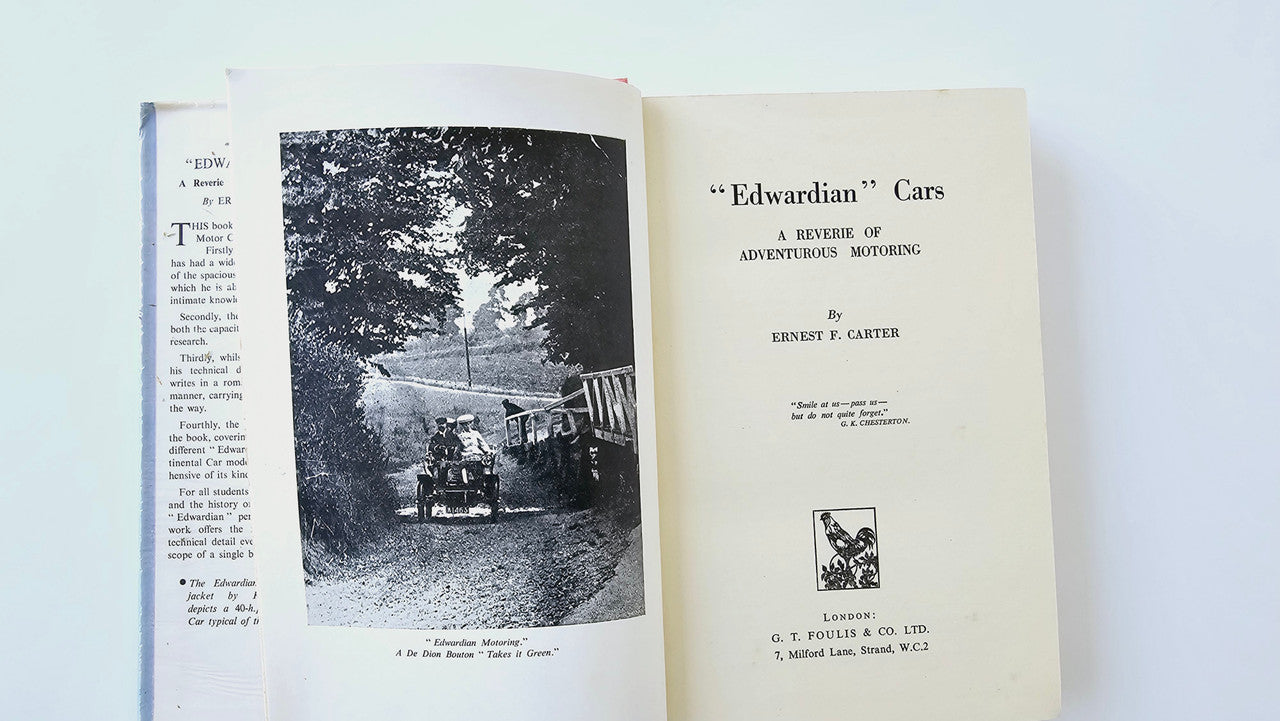 Open book with side-by-side text pages and a black-and-white vehicle photo