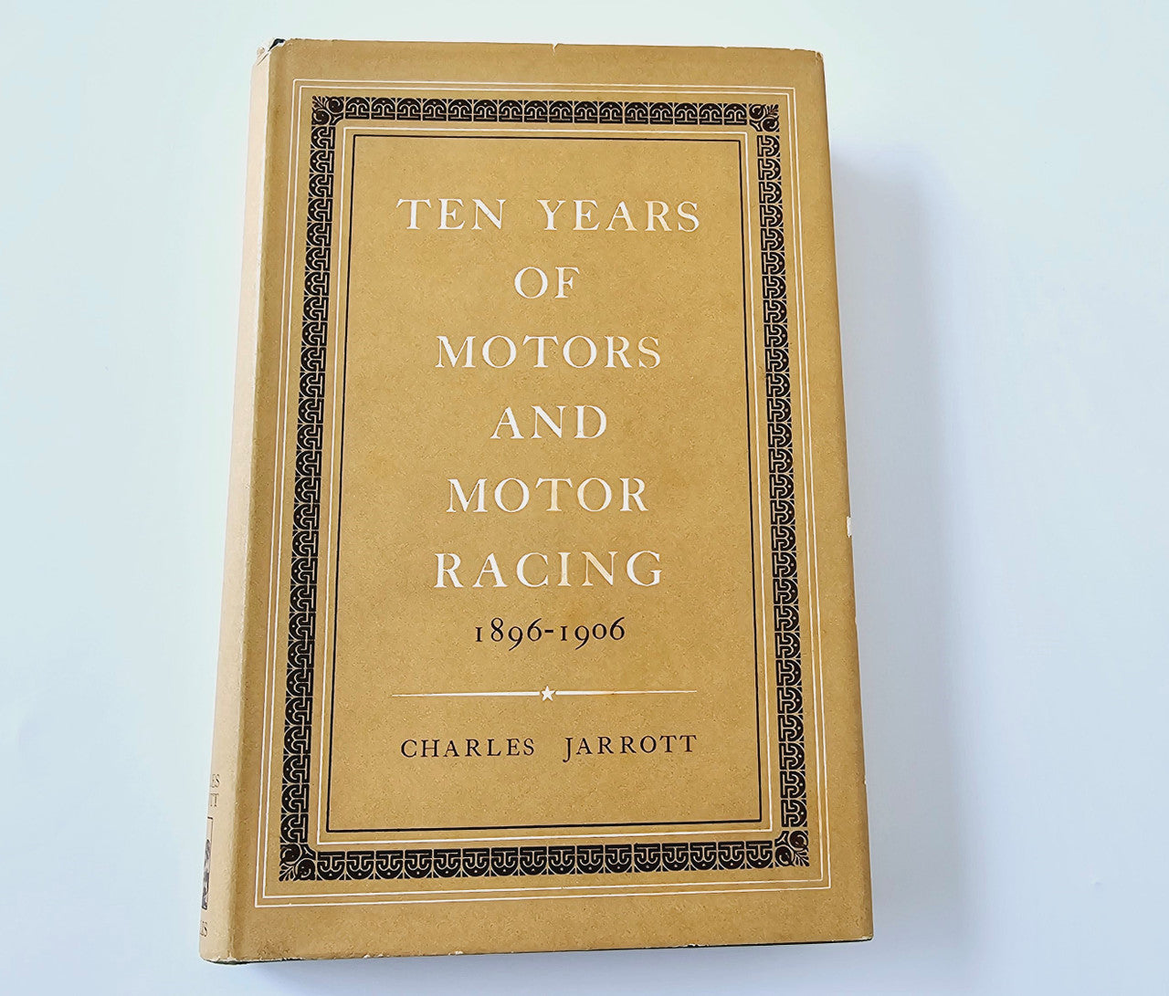 Vintage book with tan cover titled “Ten Years of Motors and Motor Racing 1896–1906”.