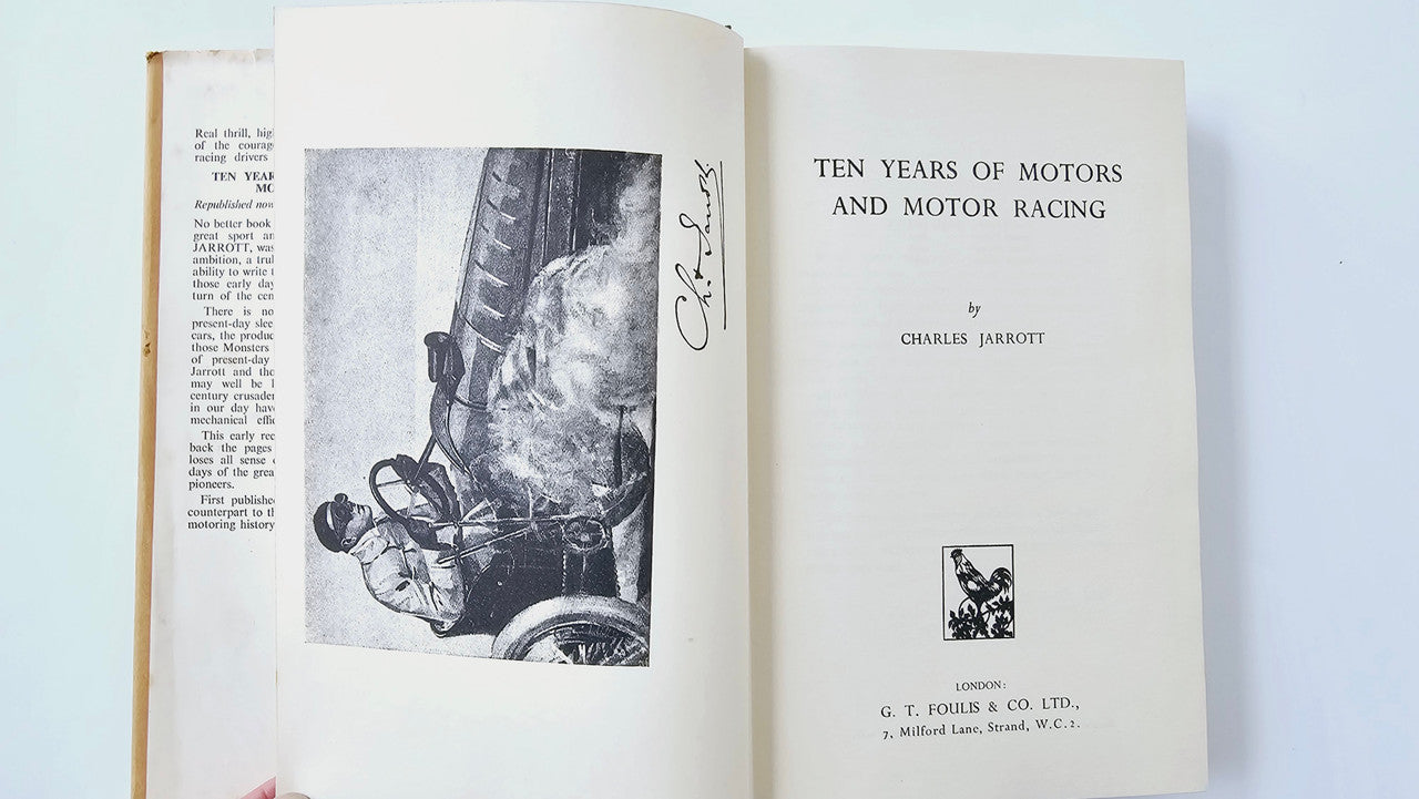 Open vintage book with title page and a black-and-white photo illustration.