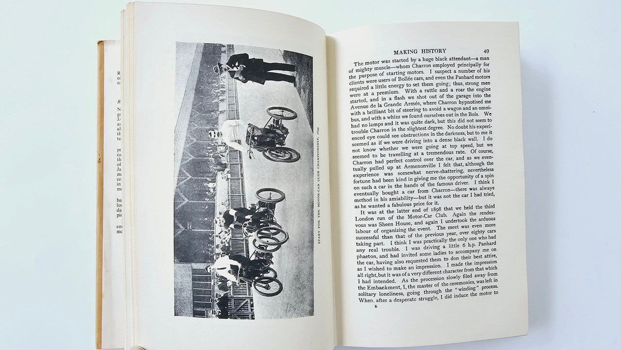 Open vintage book with a black-and-white motors photo on the left and text on the right.