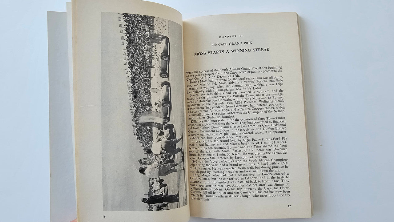 Motorsport book open to a chapter page with a black-and-white racecar image.