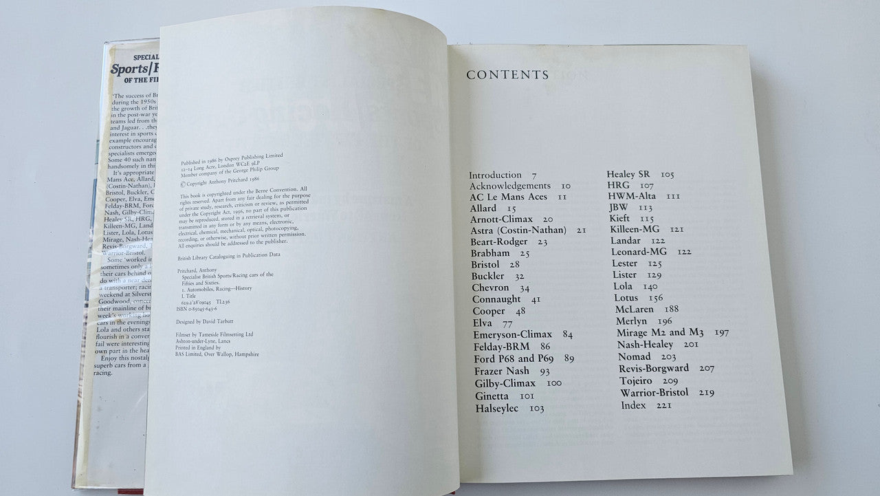 Book open to contents page with section list and page numbers