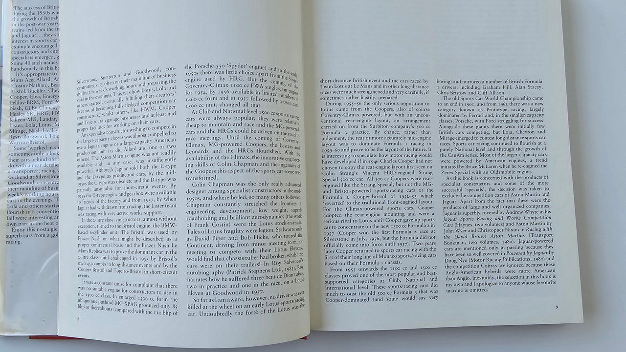 Open book spread with paragraphs of text and red-edged page edges