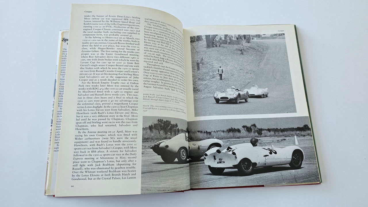 Open book spread featuring racing car photos alongside printed text