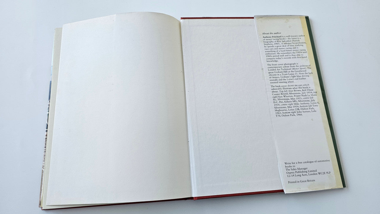 Book open with one blank page and printed text on the right