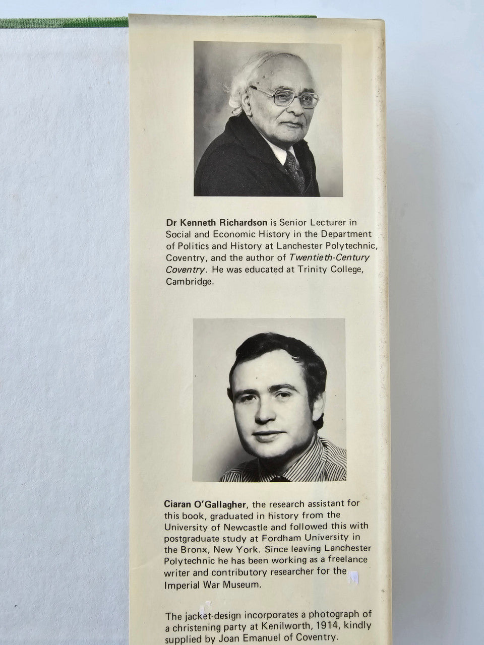 Book page with two author portraits and short biography captions