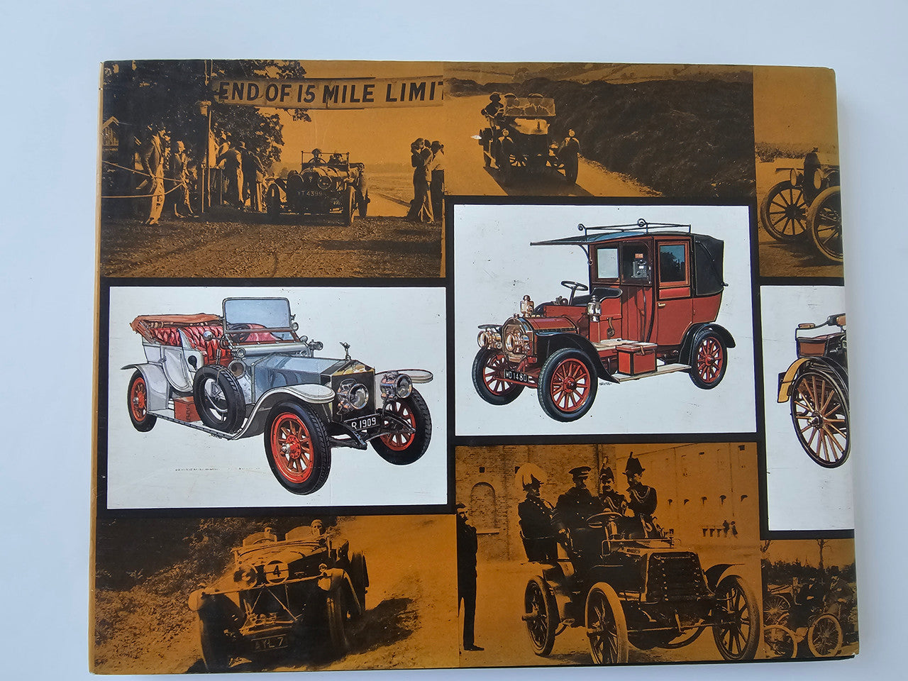 Vintage motoring history book cover with classic car illustrations and graphics