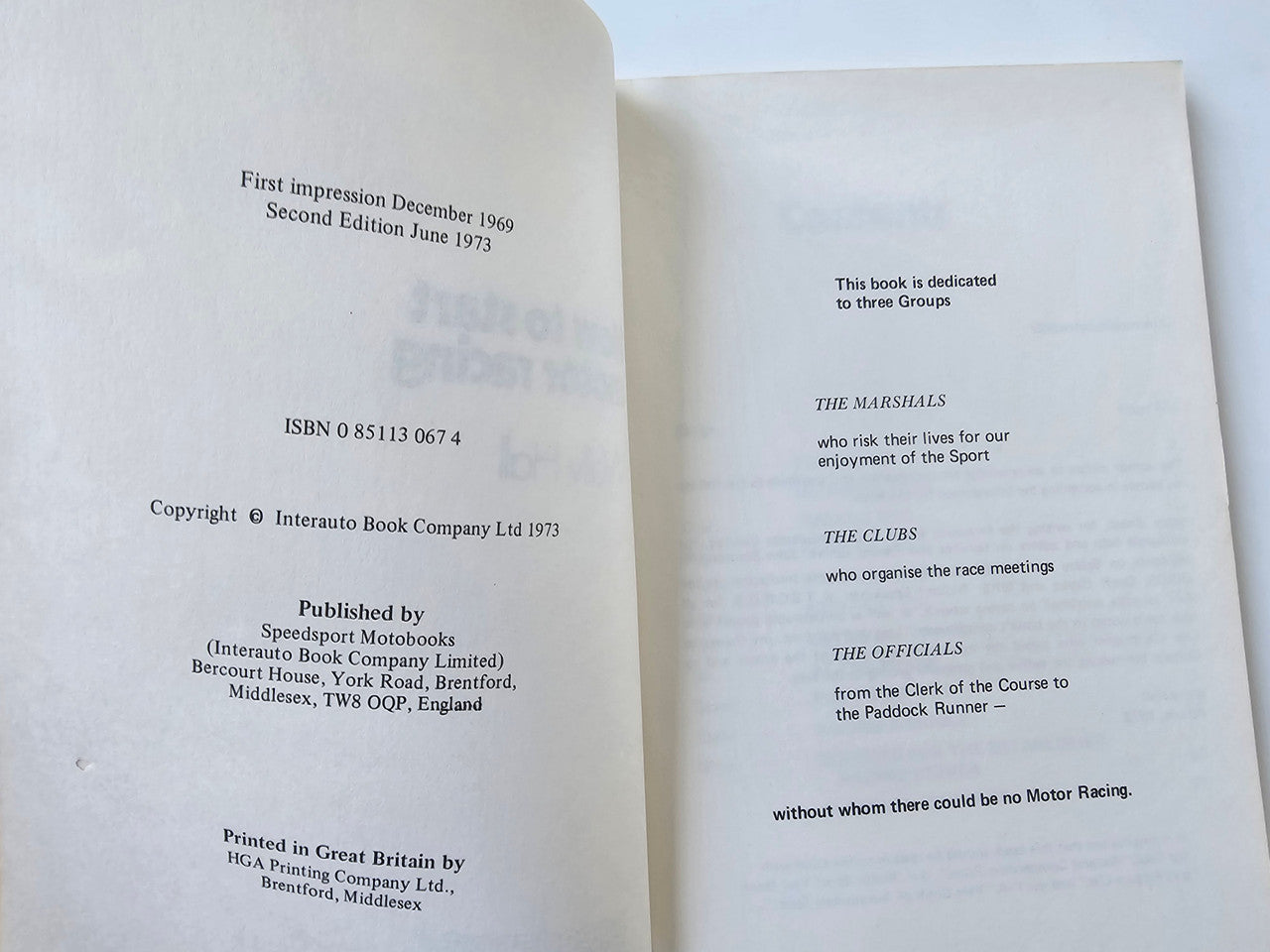 Motor racing guide book with copyright and publication text on open pages