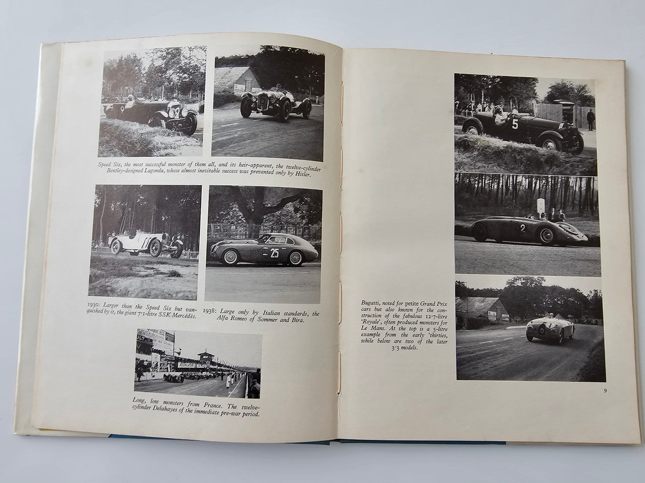 Vintage motoring book open to photo spread with multiple black-and-white race images