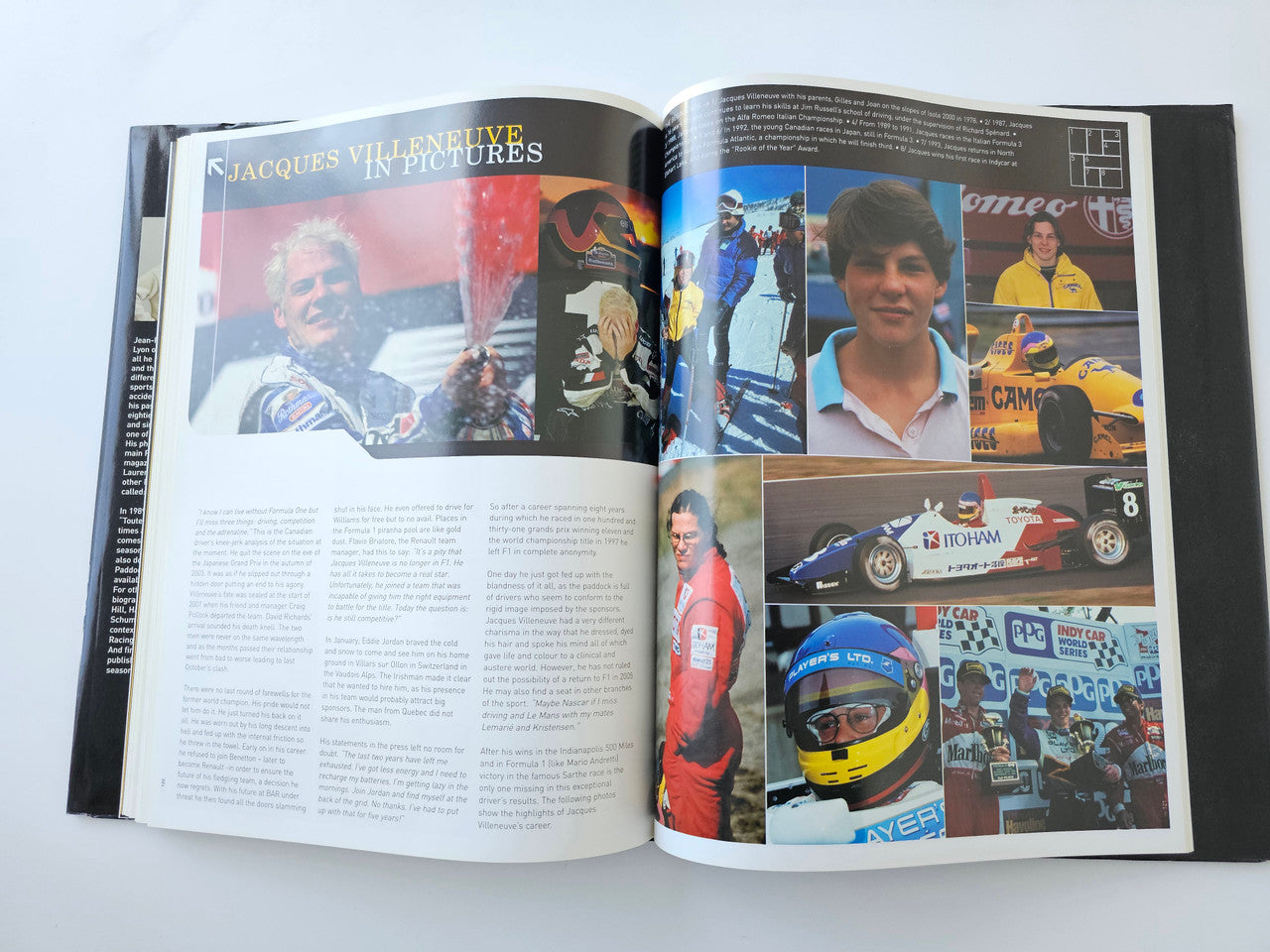 Motorsport season book, open spread with driver photos, helmets, and race cars
