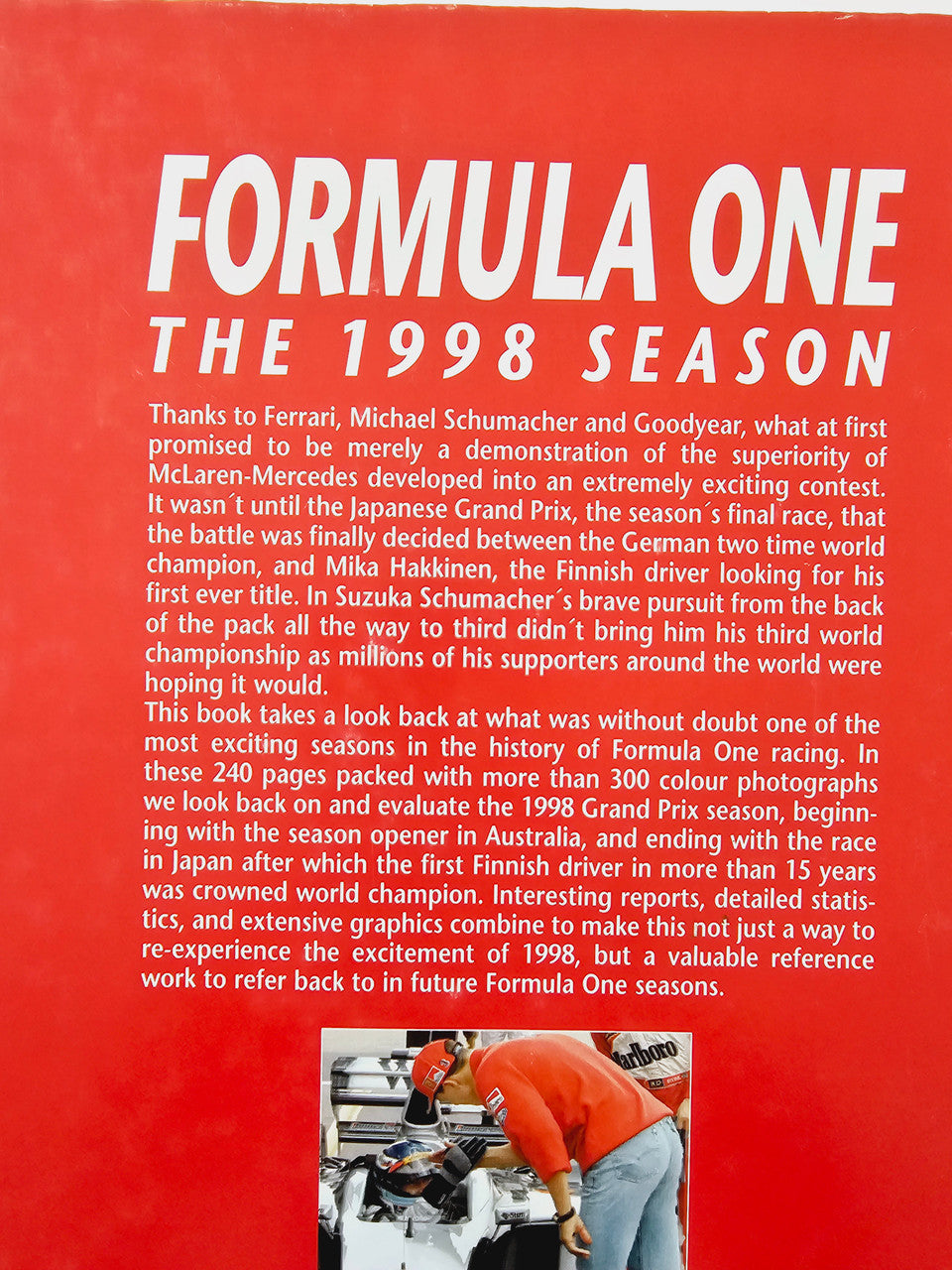Formula One The 1998 Season book cover with title text and mechanic photo