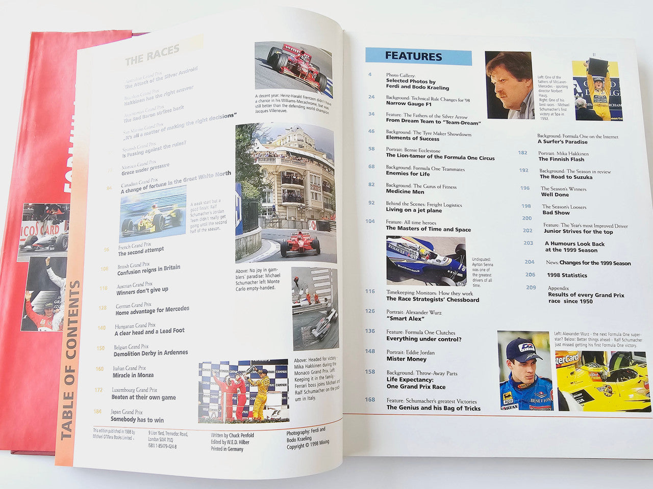 Open racing book spread with race pages, photos, and a blue “FEATURES” section