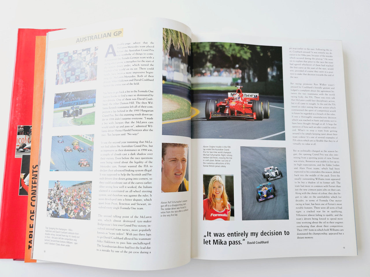 Open book spread with Australian GP text and track action photos on both pages