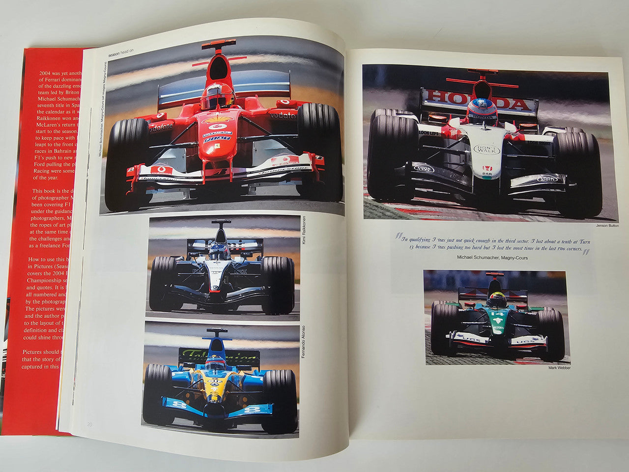 Motorsport photo book open to three car photos on the left and captioned panel on right