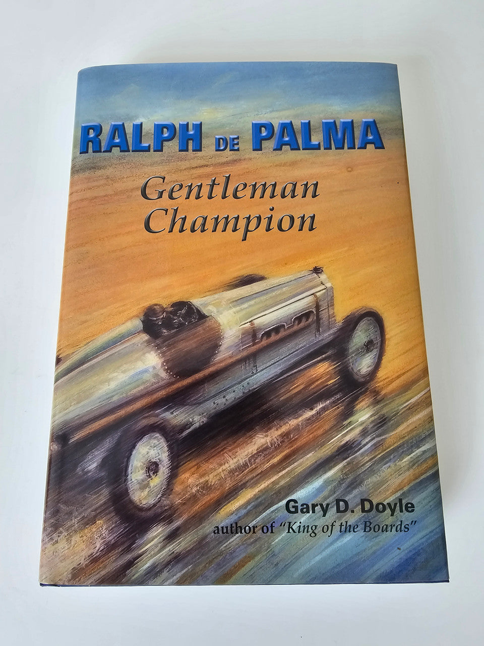 Gentleman Champion book cover with Ralph de Palma title and racing car illustration