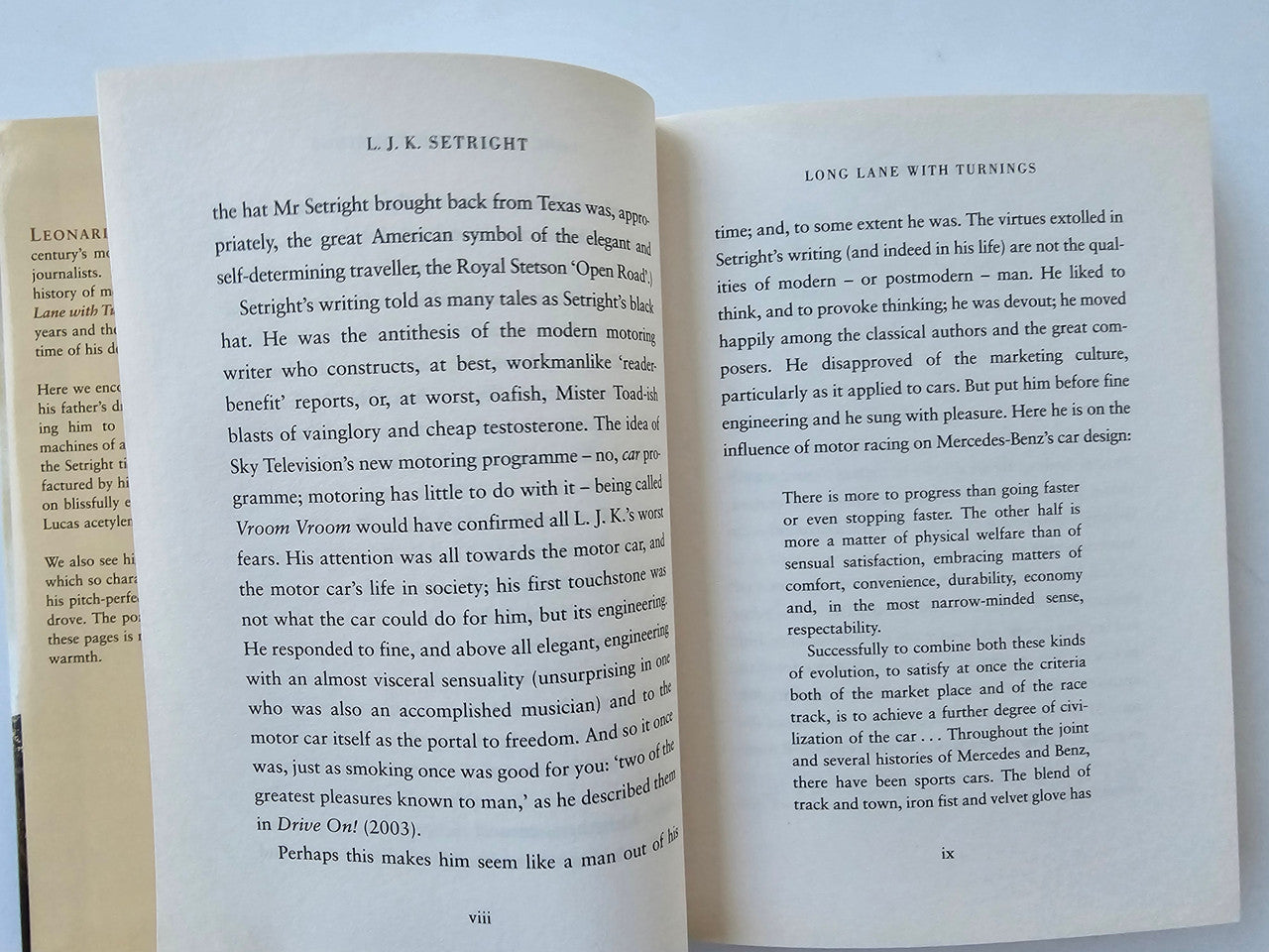 Open book spread with two columns of text and page numbers VIII and IX