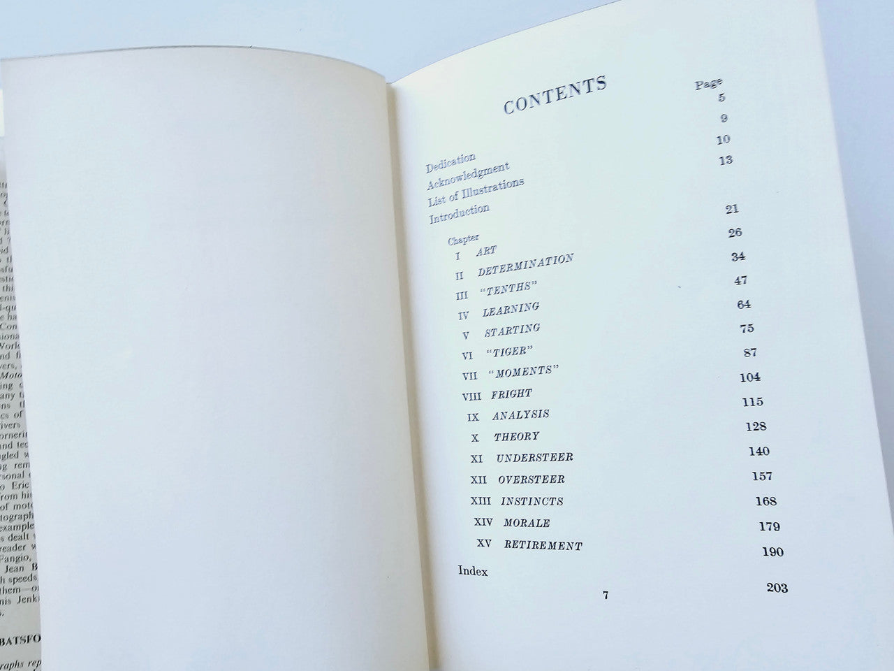 Racing Driver book open to contents page listing chapters and page numbers