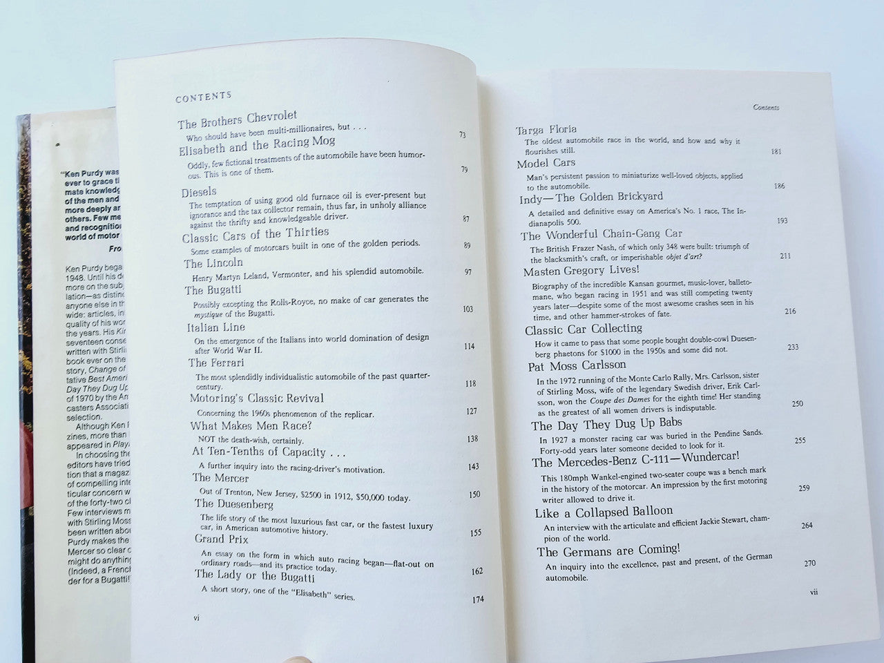 Automobile book open with two-column Contents listing of vehicle sections