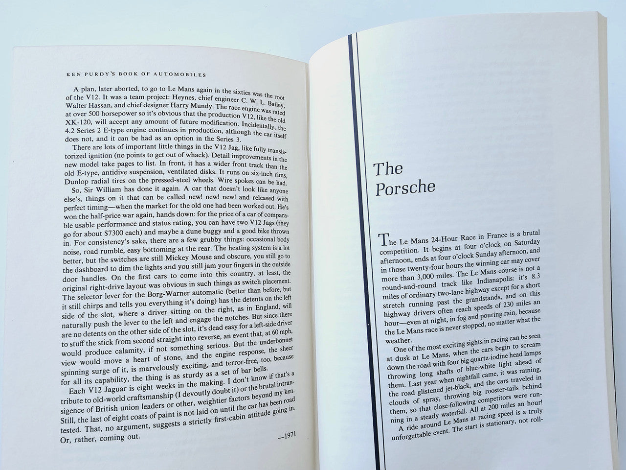 Automobile history book open to 'The Porsche' chapter on right page and text left.