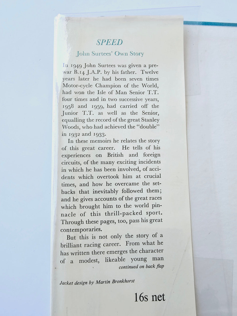 Motorsport memoir book open to main text page with "Speed" header at top