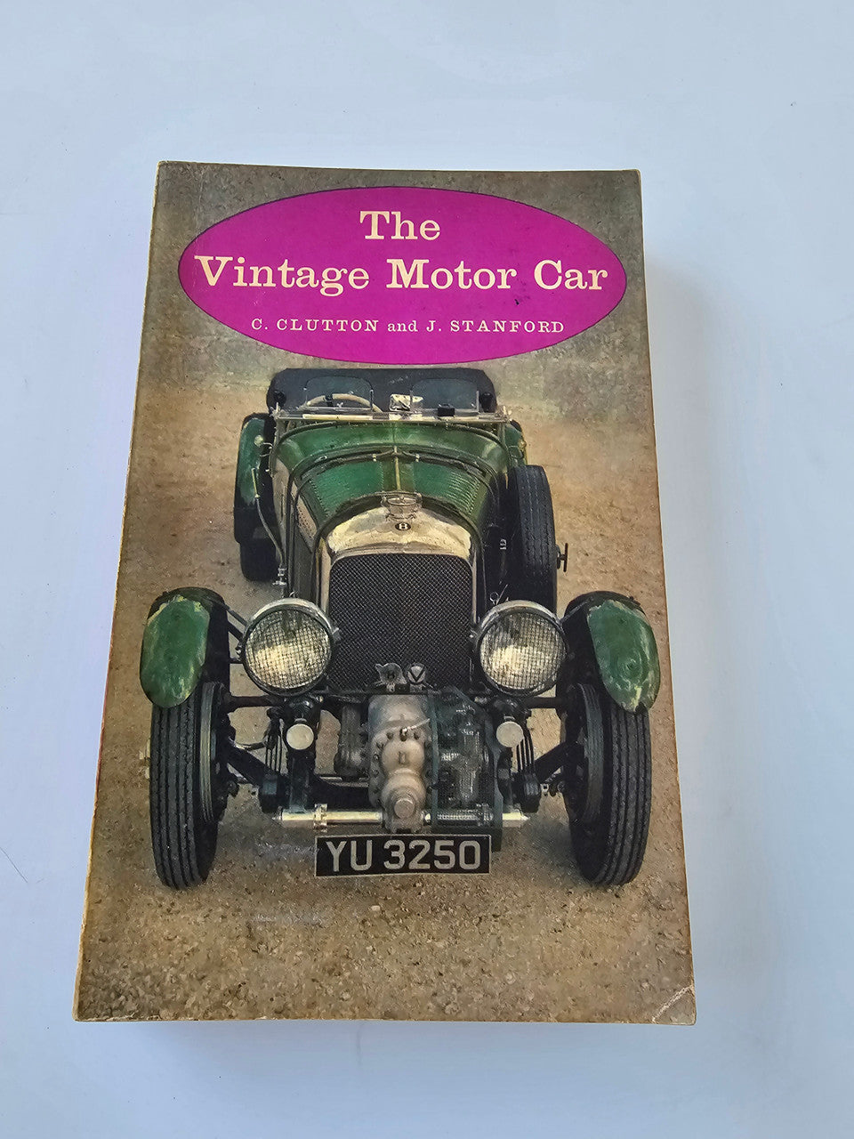 Vintage Motor Car book, cover with front view of a green classic car