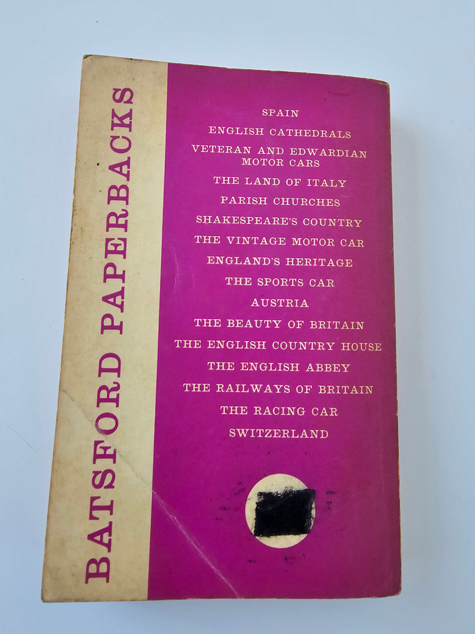 Vintage Motor Car book, purple back cover with listed titles and small cutout