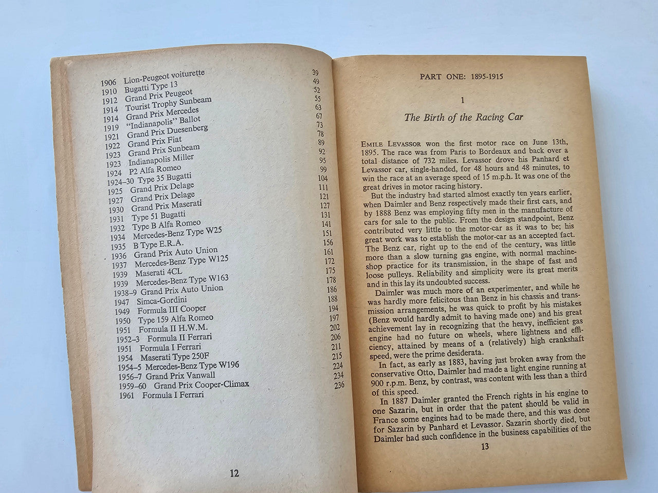 Open book spread with timeline-style text and a section heading on beige pages