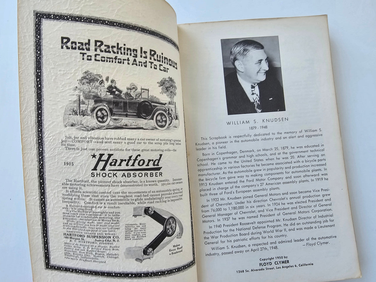 Vintage motor scrapbook open pages with vehicle illustrations and a short biography page.