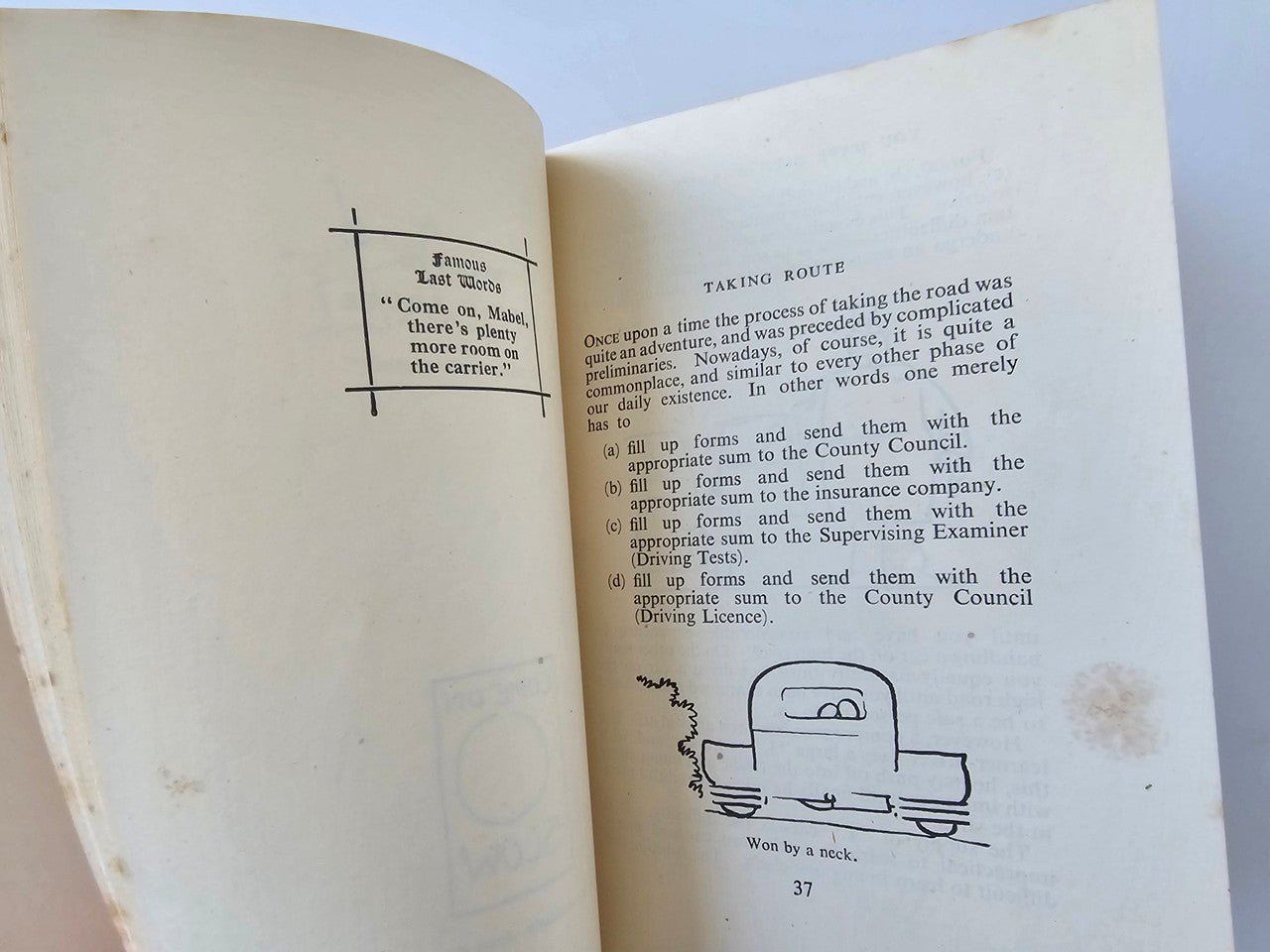 Vintage book open to “Taking Route” page with diagrams and instructions