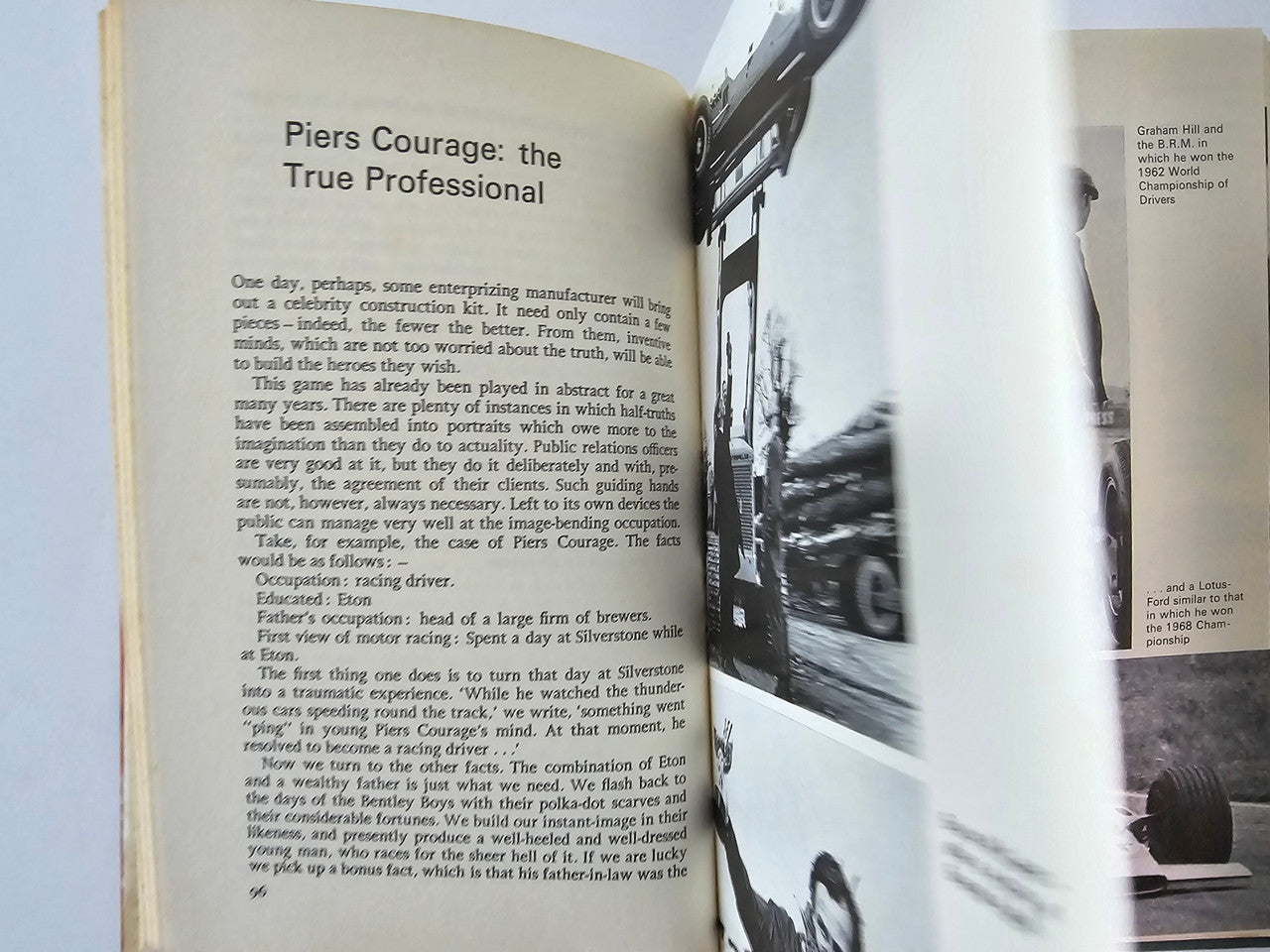 Book open to a chapter page with black-and-white race photo inset