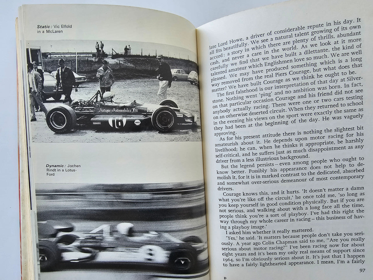 Book open to black-and-white racing photo and printed text pages