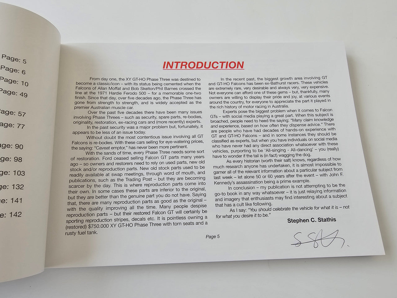 Paperback book open to INTRODUCTION page with printed paragraphs