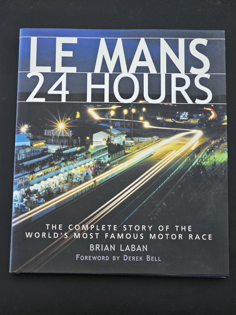Le Mans 24 Hours book cover with blue title and night race-track photo