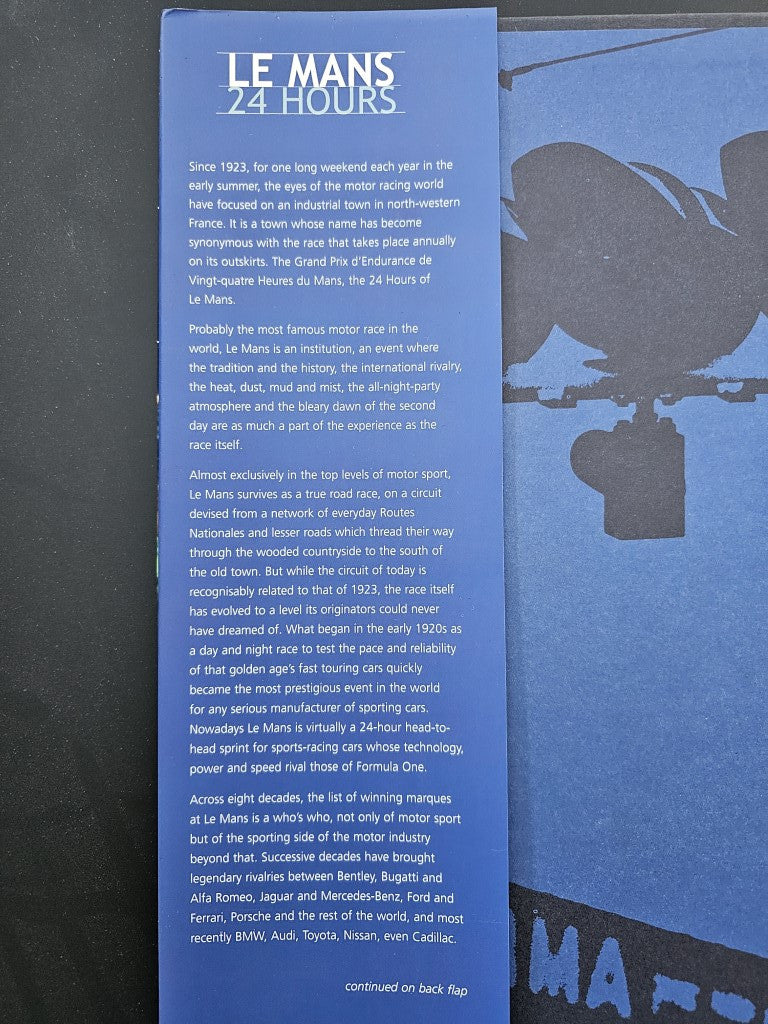 Le Mans 24 Hours book cover with blue title text and stylized racing engine silhouette