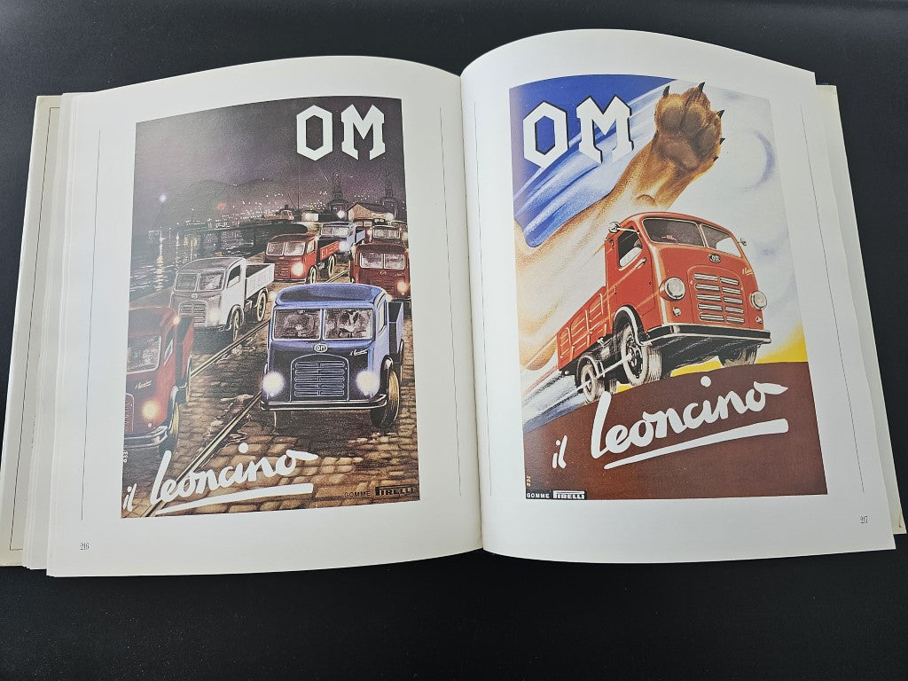 Open book with OM title panels and vintage vehicle illustrations, two-page spread