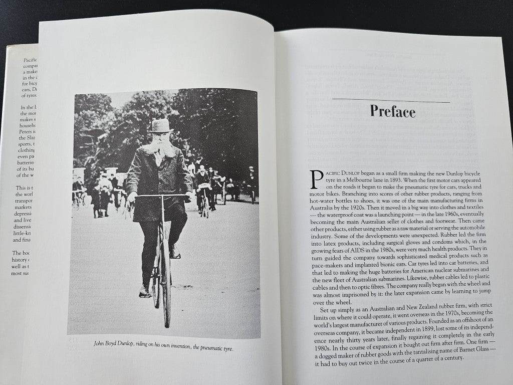 Book open to “Preface” page with black-and-white portrait photo on the left