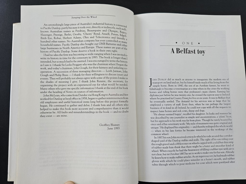 Book open spread with chapter section titles and dense printed paragraphs on both pages