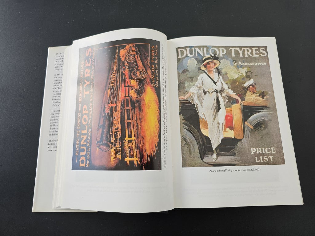 Book open spread with industrial photo on the left and “Dunlop Tyres” price list on the right