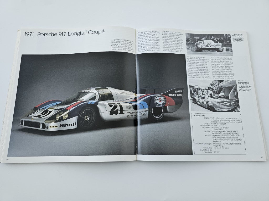 Vehicle history book: open spread with 1971 Porsche 917 Longtail Coupé race car photo.