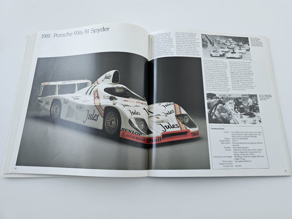 Vehicle history book: open spread with 1981 Porsche 936 81 Spyder article and photo pages.