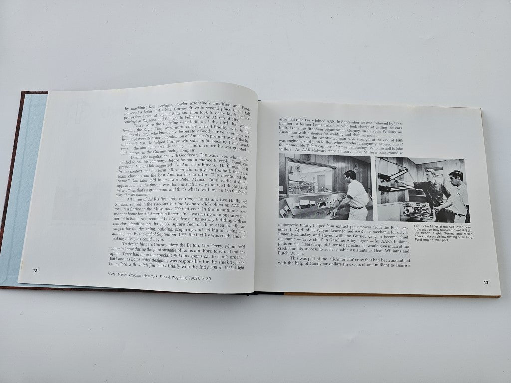 Open book spread featuring black-and-white car and workshop photos with captions.