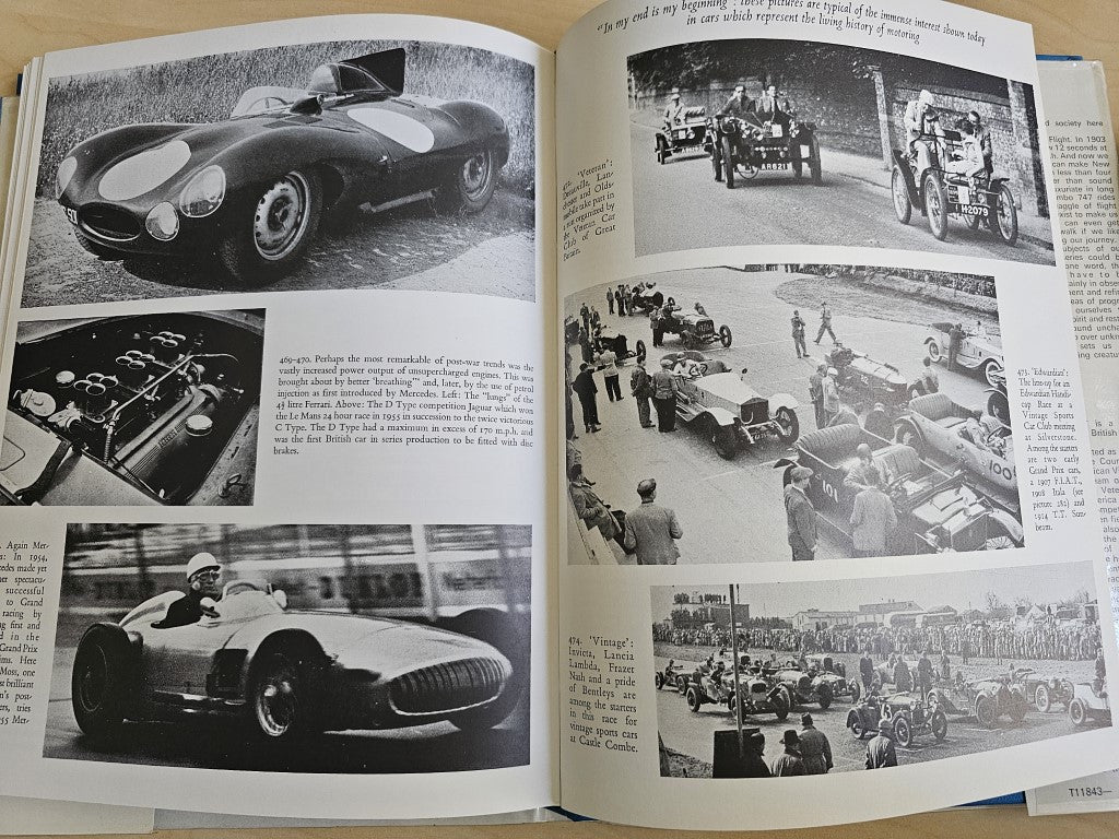 Open pictorial history book page spread with grayscale classic car photographs
