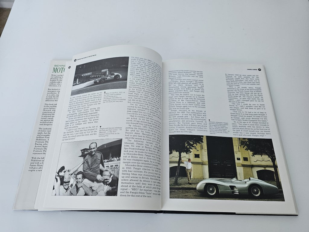 Motor racing book open with vintage car photo and portrait images