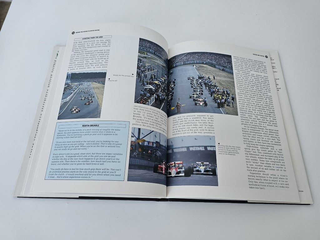 Motor racing book open to track photo spread with crowd and cars