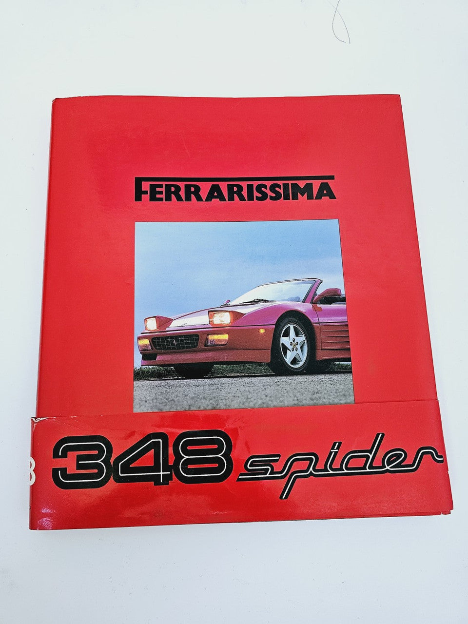 Ferrarissima No. 18 red cover booklet with photo window and 348 Spider text