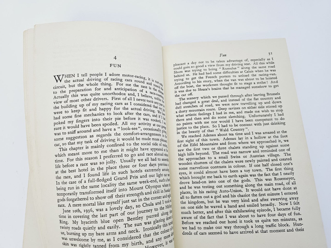 Open book with dense printed text on two facing pages