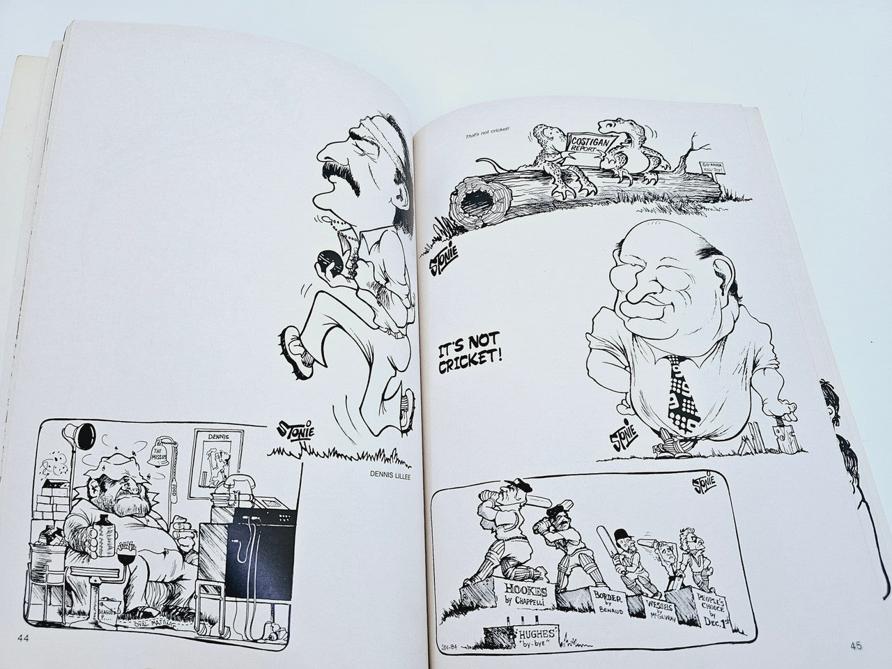Open book spread with black-and-white cartoons and captions, two page layout