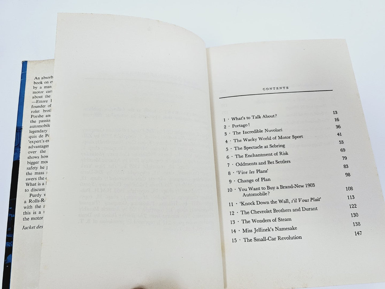 Opened automobile book with contents list pages and numbered sections.
