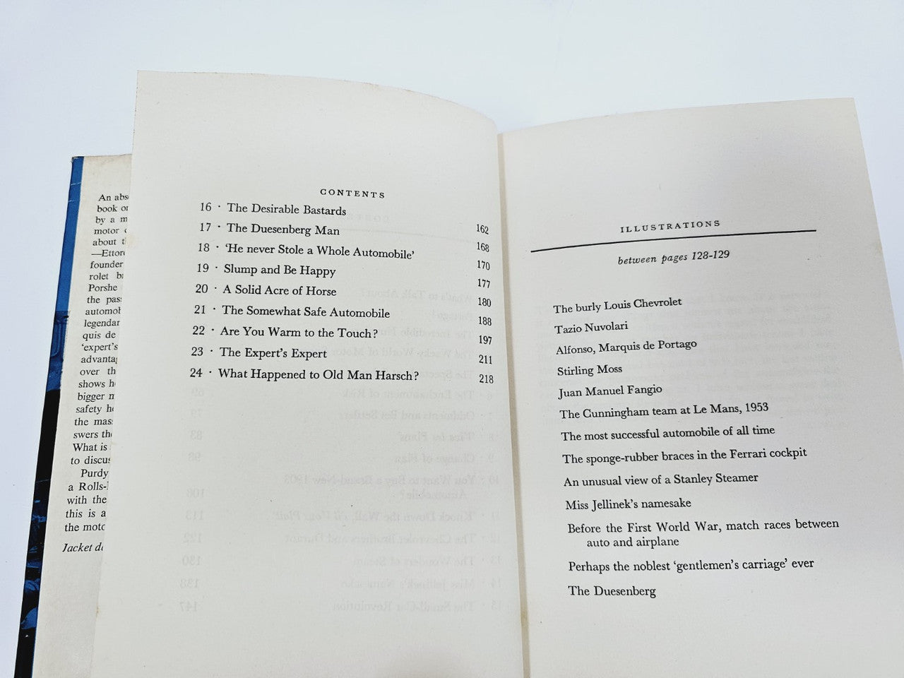 Opened automobile book with contents pages and an "ELECTR..." heading.
