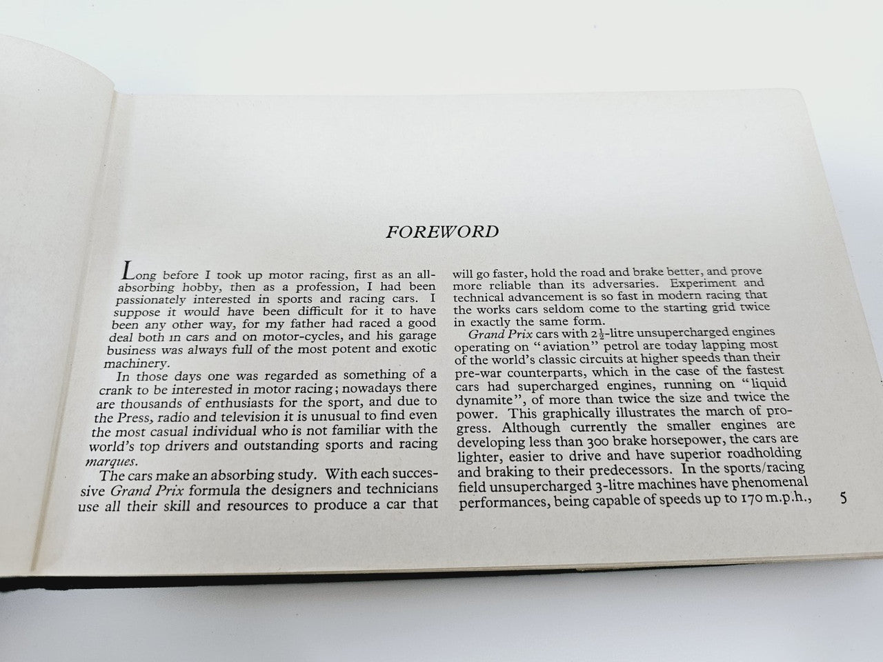 Open book displaying “FOREWORD” page with paragraphs of printed text